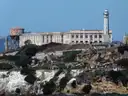 The Alcatraz cellhouse, water tower and lighthouse on top of the island