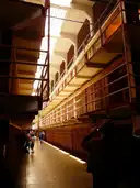 A long hallway between cell blocks in Alcatraz