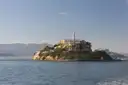 Alcatraz Island in soft afternoon light, seen from a boat