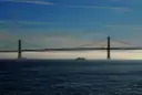 The Bay Bridge over the water on a hazy morning