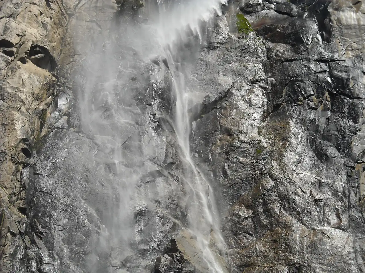 Bridalveil Fall spilling down the granite wall in Yosemite Valley