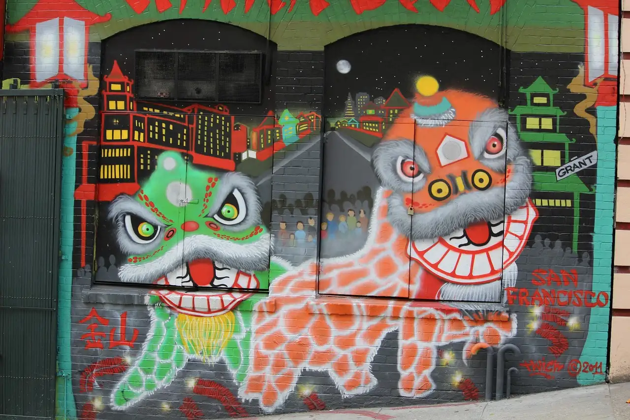 A mural of two lion-dance dragons on a wall in Chinatown