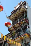 A pagoda-style building with lanterns in San Francisco's Chinatown
