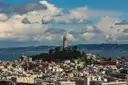 Coit Tower on Telegraph Hill above North Beach and the bay
