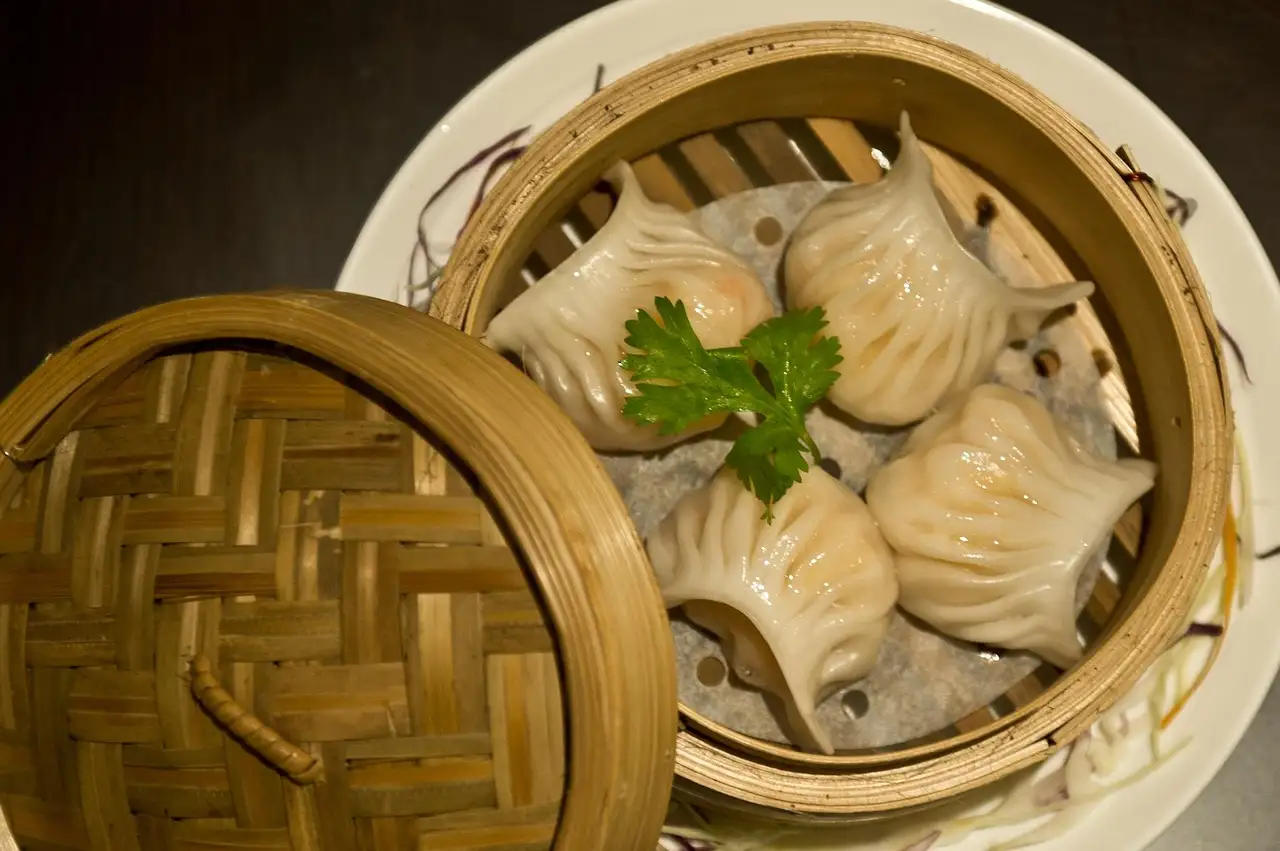 Shrimp dumplings in a bamboo steamer