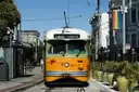 A vintage F-line streetcar on a San Francisco street