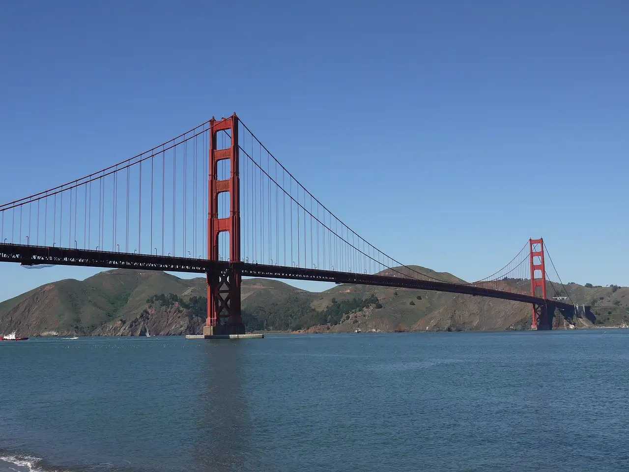 The Golden Gate Bridge over calm water