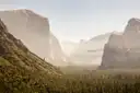 Yosemite Valley with El Capitan rising above the forest in soft morning light