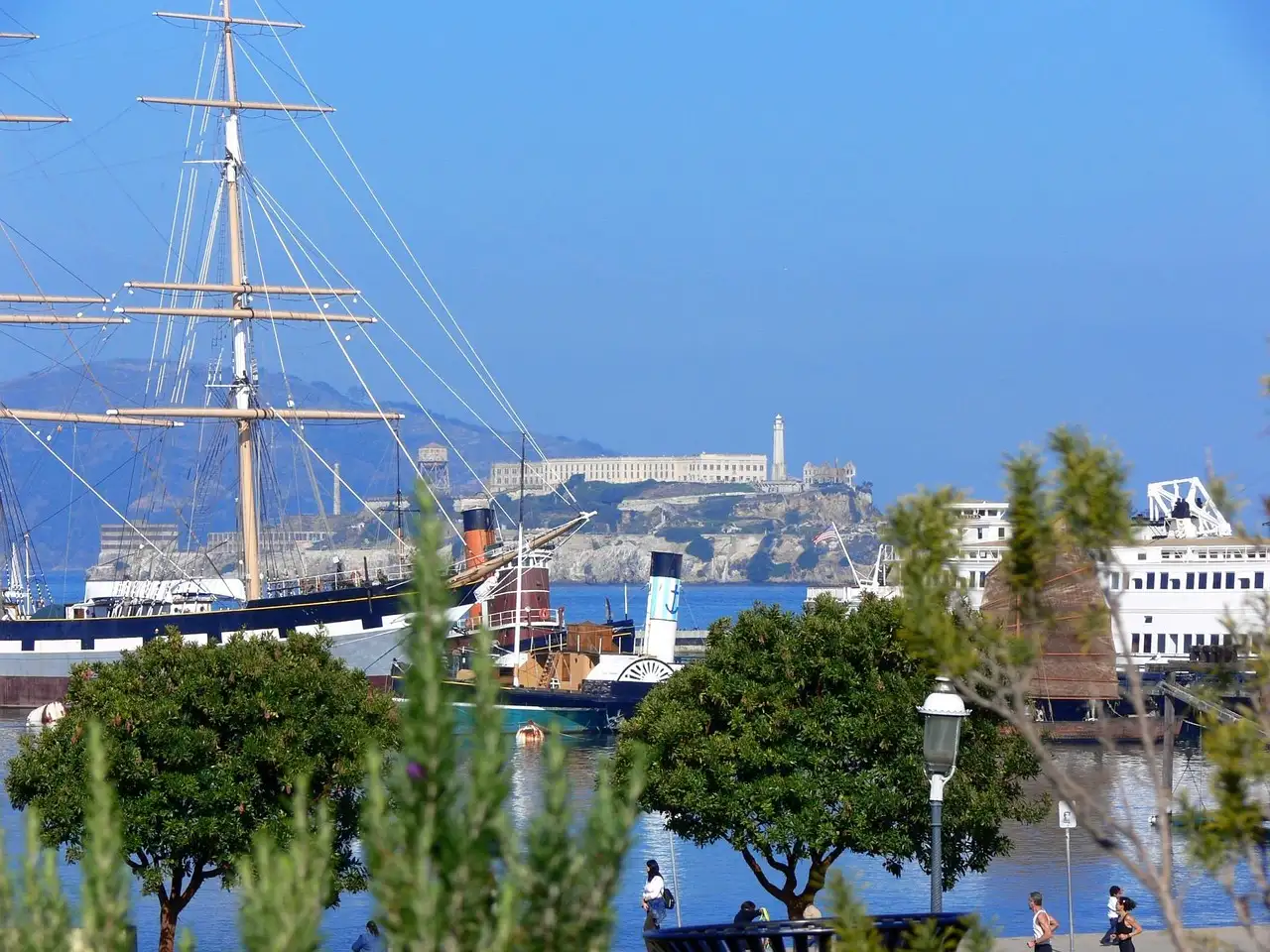 A tall ship at Hyde Street Pier, Fisherman's Wharf, with Alcatraz behind