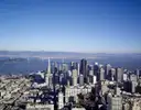 The San Francisco skyline and the bay seen from a hill on a clear day