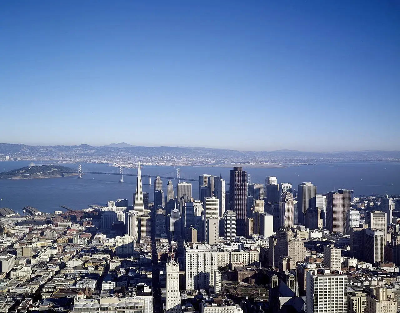 The San Francisco skyline and the bay seen from a hill on a clear day