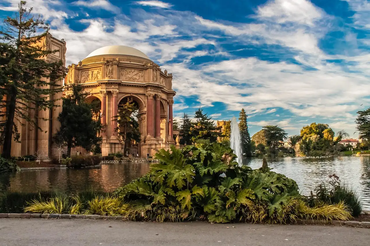 The Palace of Fine Arts across its lagoon, framed by trees