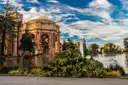 The Palace of Fine Arts across its lagoon, framed by trees