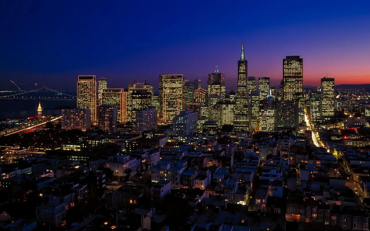 The lit-up downtown skyline, a sight on the optional night tour