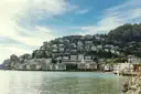 Homes on the green hillside of Sausalito above the bay