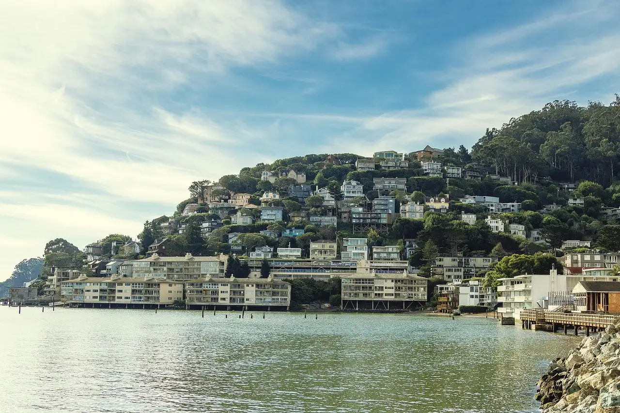 Homes on the green hillside of Sausalito above the bay