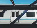 A BART train stopped at a station platform in the Bay Area