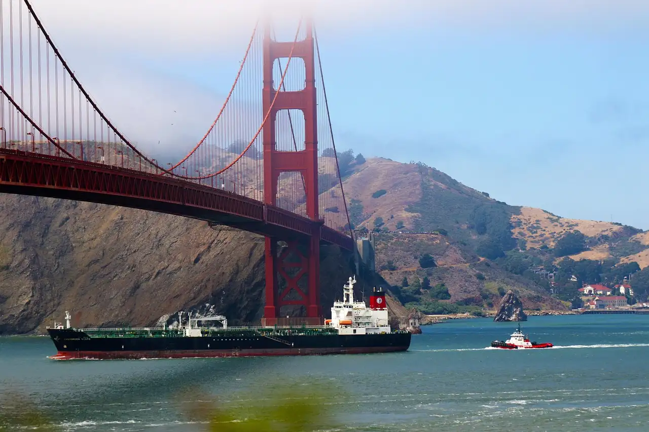 A ship sailing under the Golden Gate Bridge
