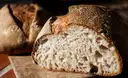 A loaf of sourdough bread cut open