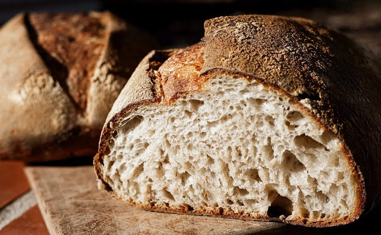 A loaf of sourdough bread cut open