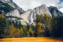 Yosemite Falls above a meadow in autumn