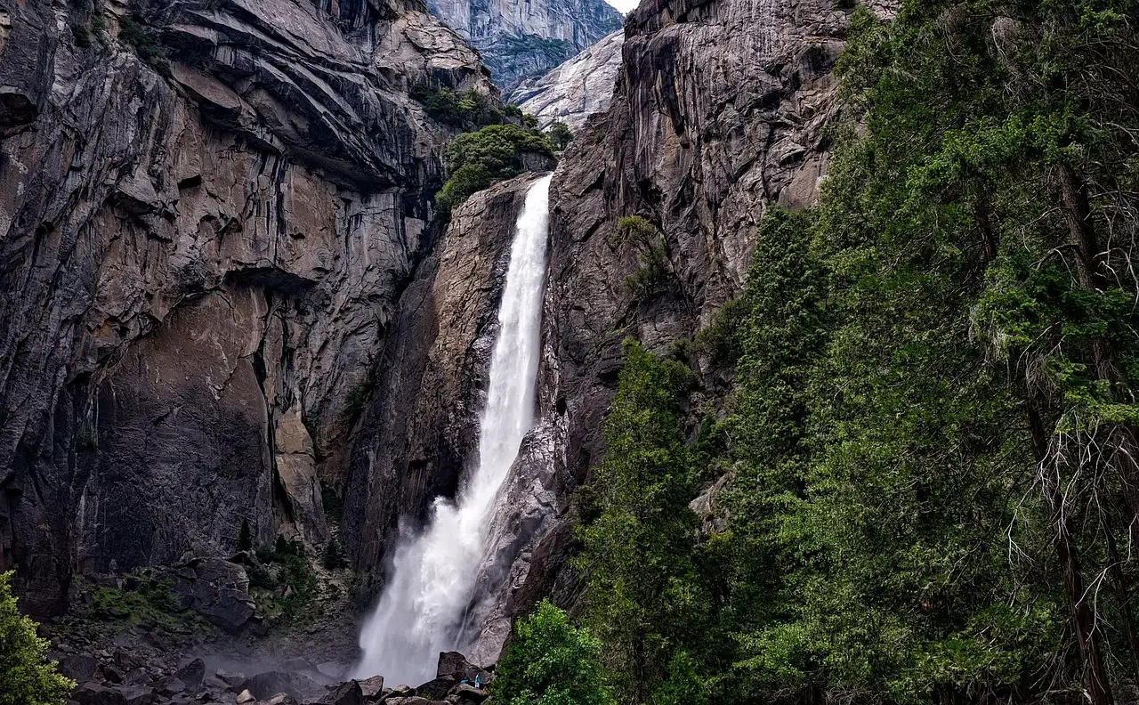 Lower Yosemite Fall pouring down a granite cliff
