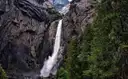 Lower Yosemite Fall pouring down a granite cliff